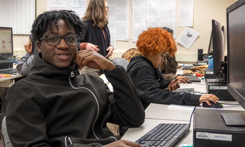 Two students working in the computer lab.